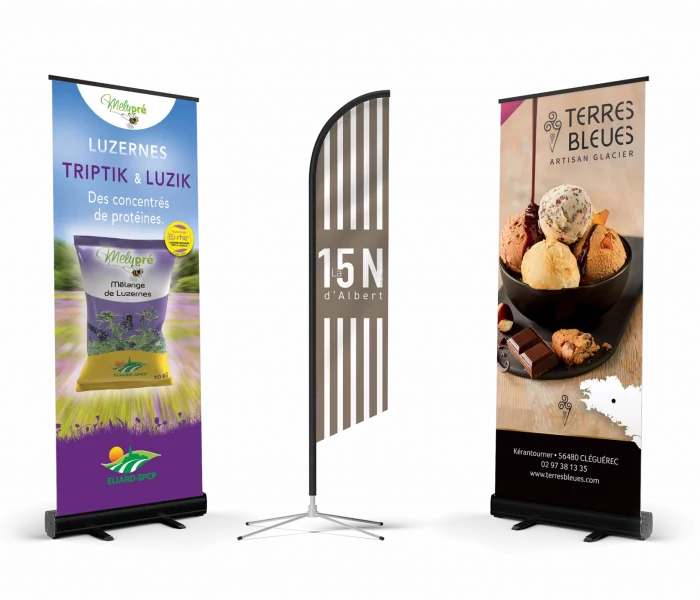 De gauche à droite : roll-up Eliard-SPCP, drapeau plume pour La 15 N d'Albert, et roll-up pour Glaciers Terres Bleues, réalisés par Yescom.